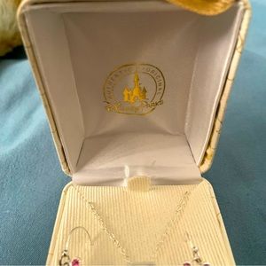 This is a earring and necklace set of Disney jewelry. Great for a gift.
